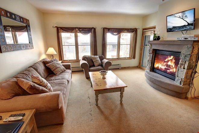 image The living area is spacious and the large windows let in lots of natural light