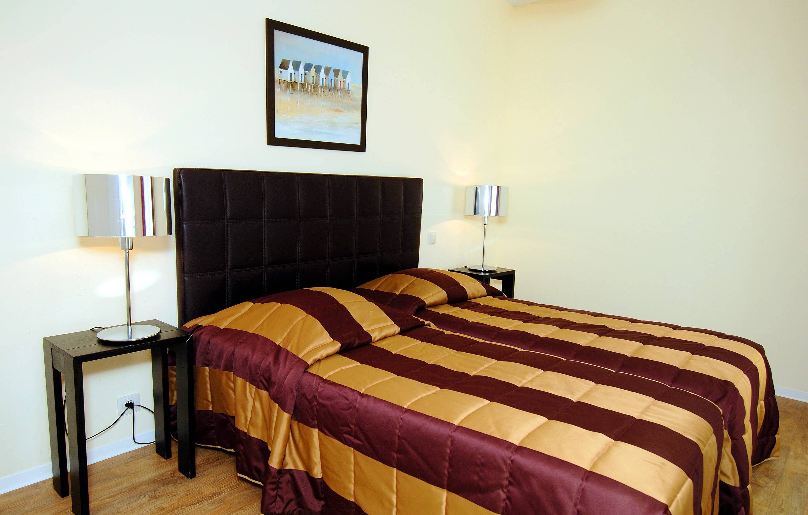 image Fall asleep in our cozy bedroom that has 2 Single beds that can be pushed together.