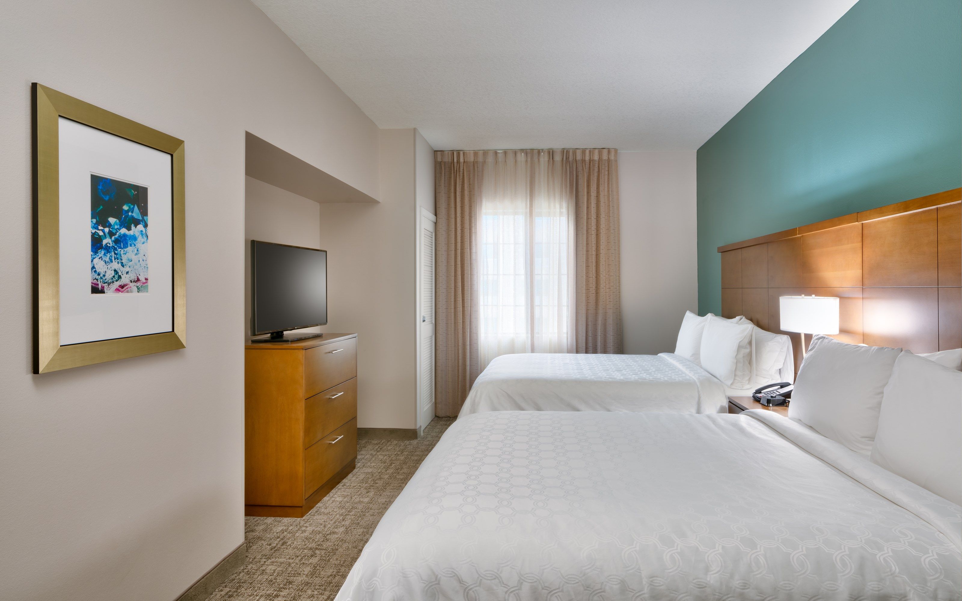 image Drift to sleep in a comfortable bed after a wonderful day outside.