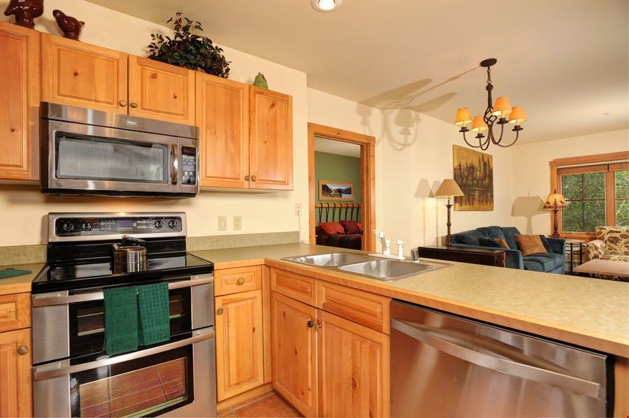 image The fully-equipped kitchen features stainless steel appliances