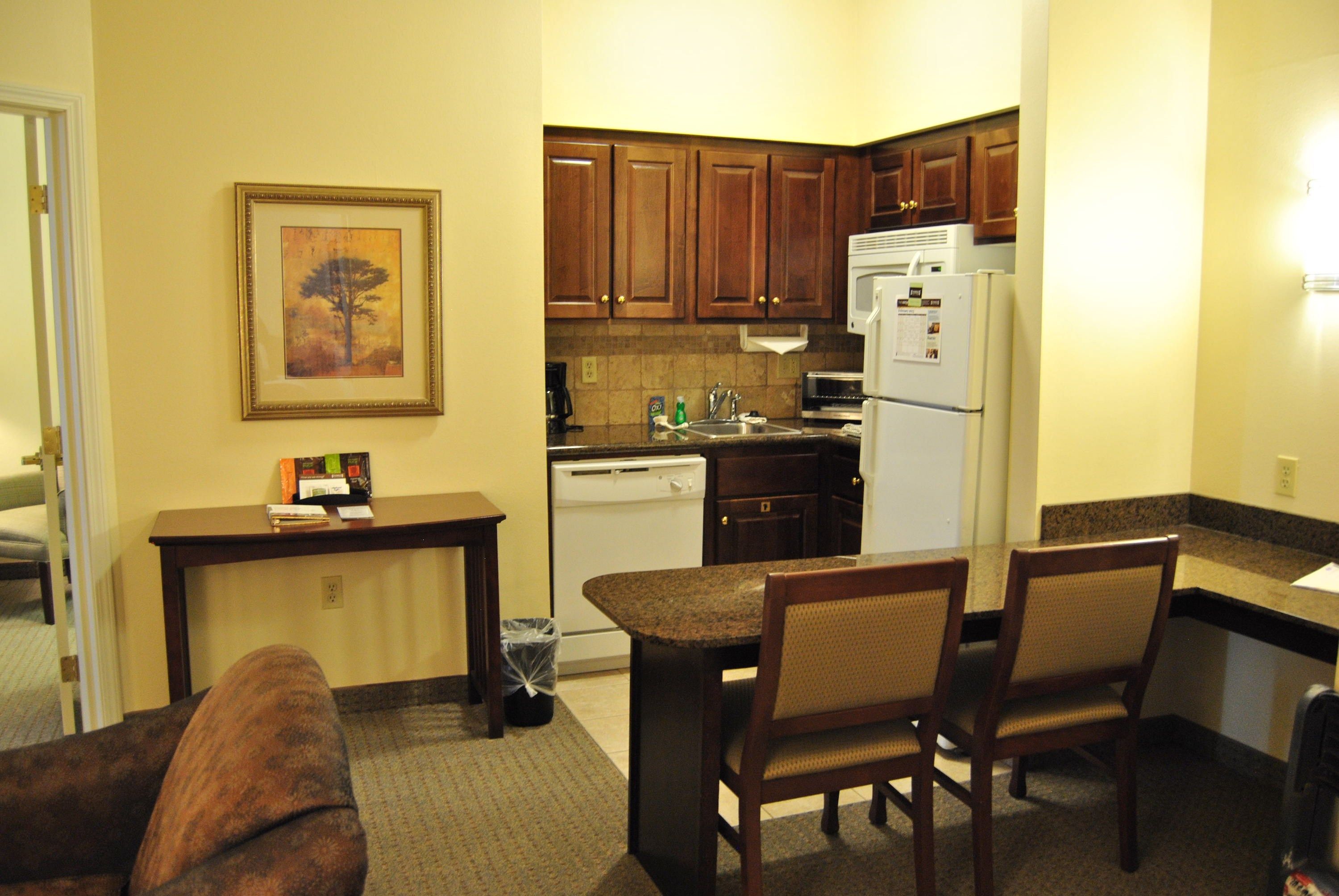 image Cook up your favorite meals in this fully-equipped kitchen, complete with modern appliances and ample counter space.