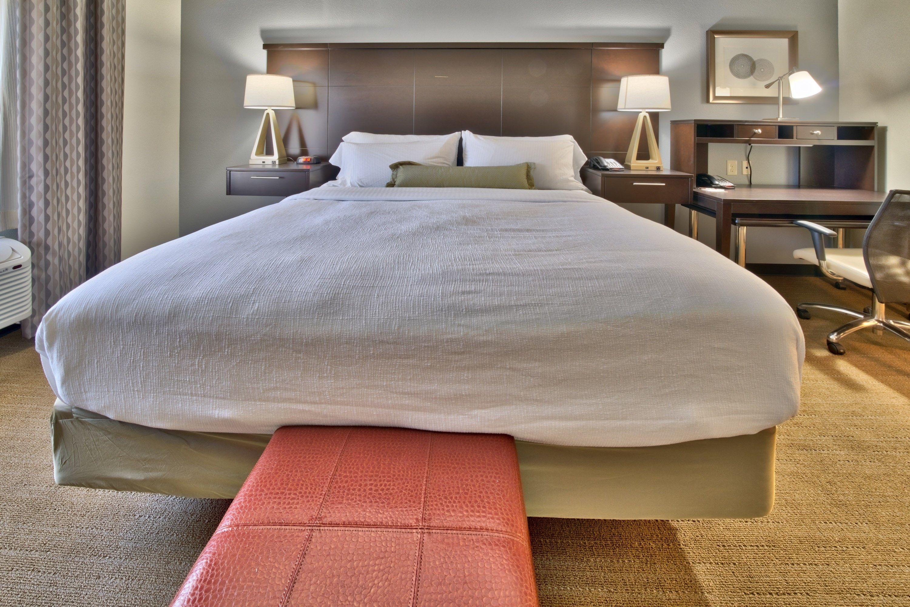 image Drift to sleep in a comfortable bed after a wonderful day outside.