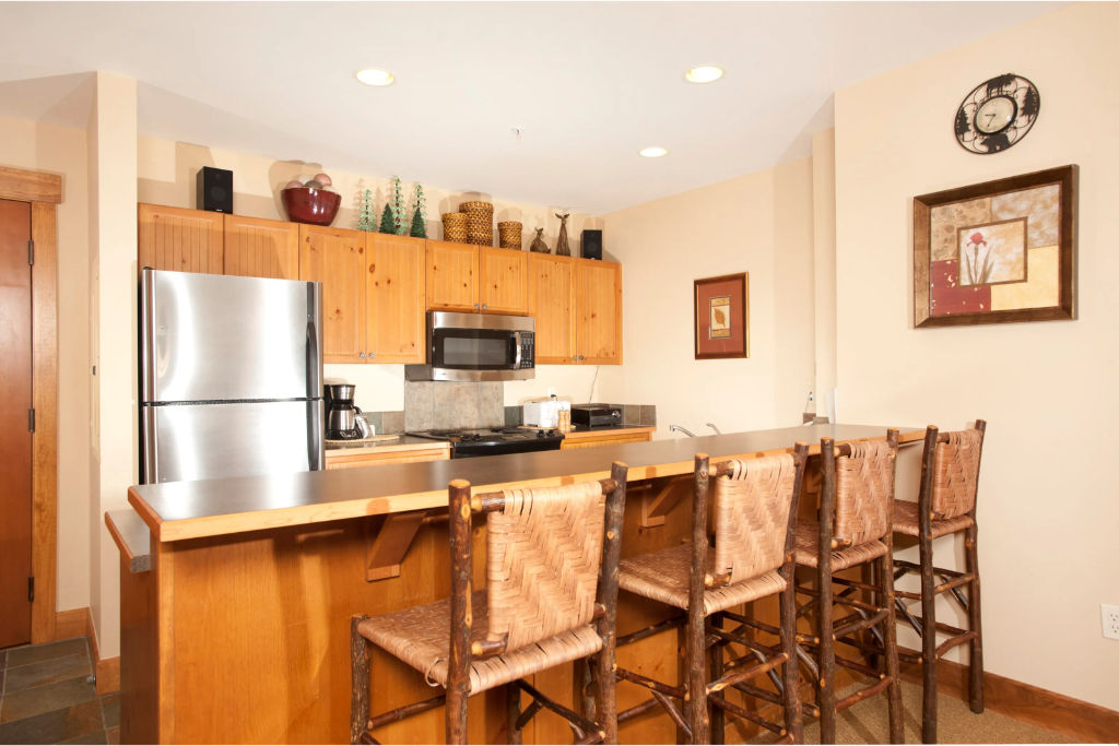 image Enjoy cooking in the fully-equipped kitchen, complete with stainless steel appliances