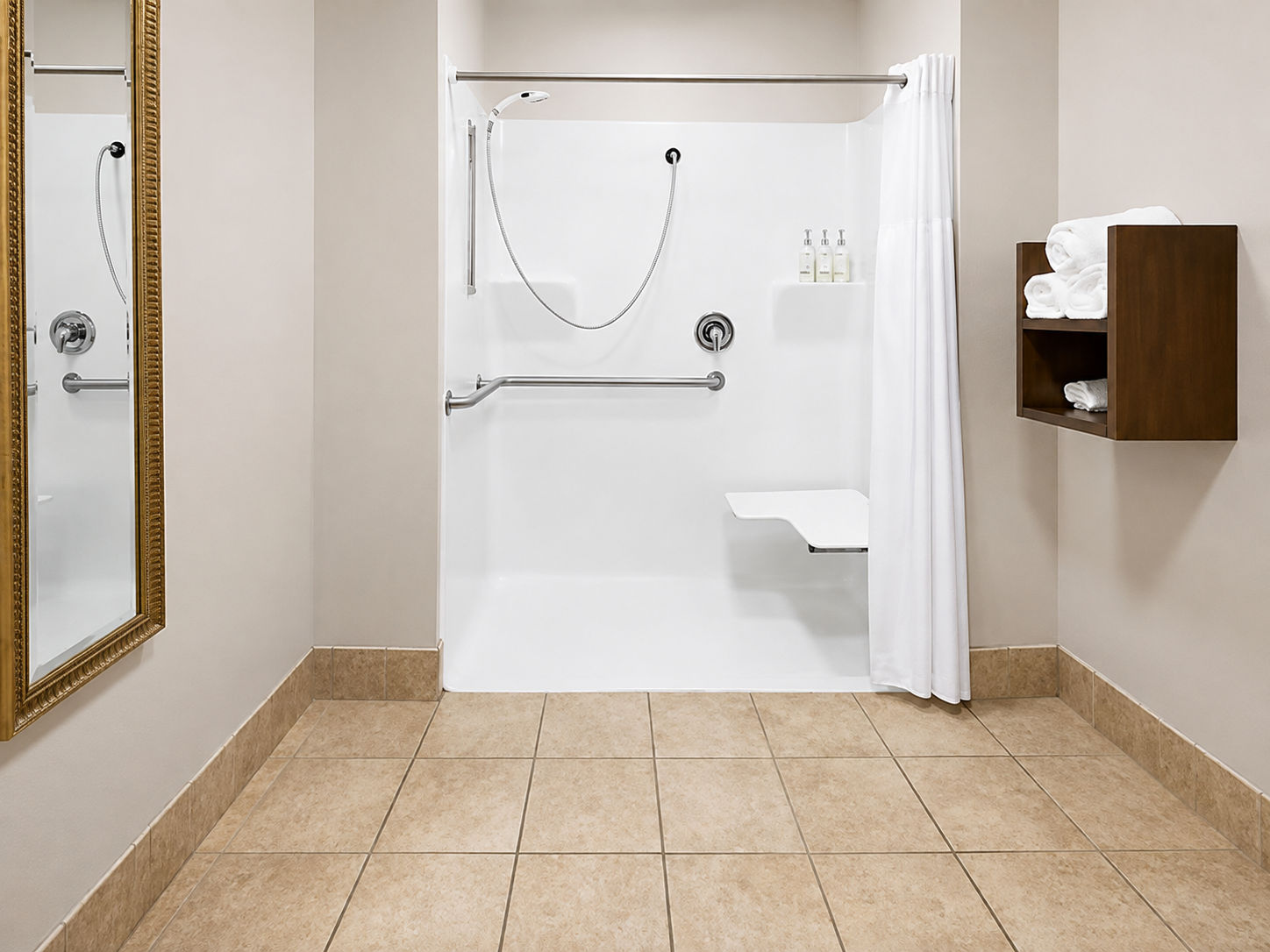 image Accessible bathroom with roll-in shower and ample space.