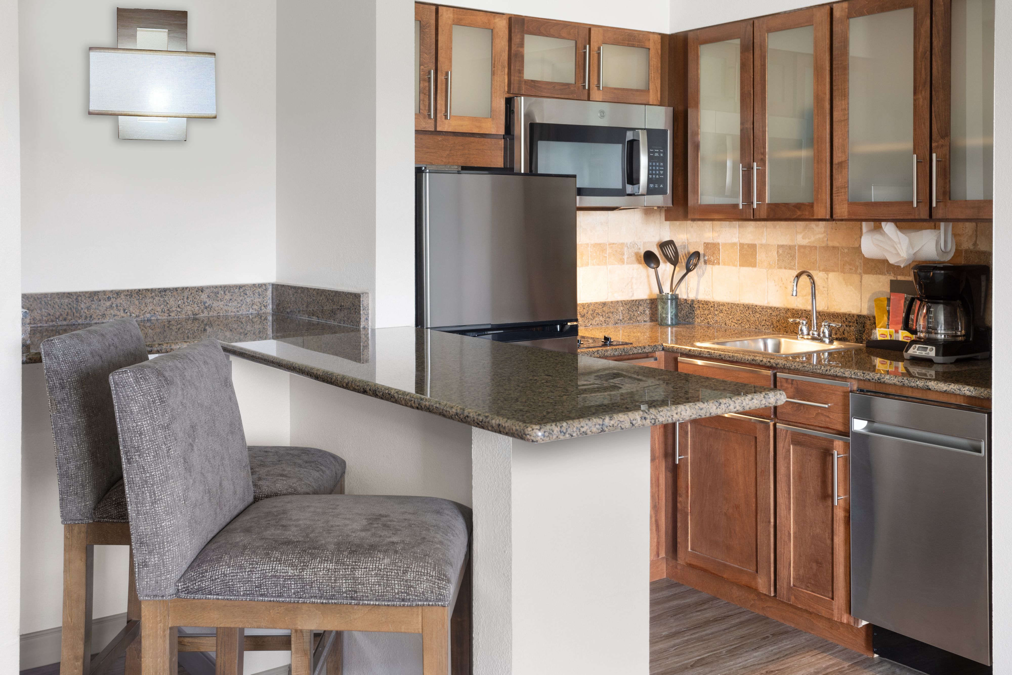 image Fully equipped kitchen with modern appliances and ample counter space.