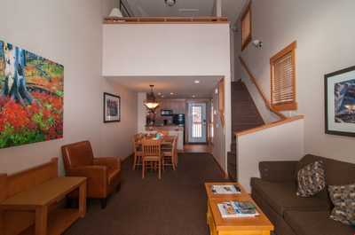 The beautiful open-plan living space is warm and inviting.