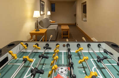 Have fun in the recreational room, equipped with a foosball table and plenty of space to unwind.