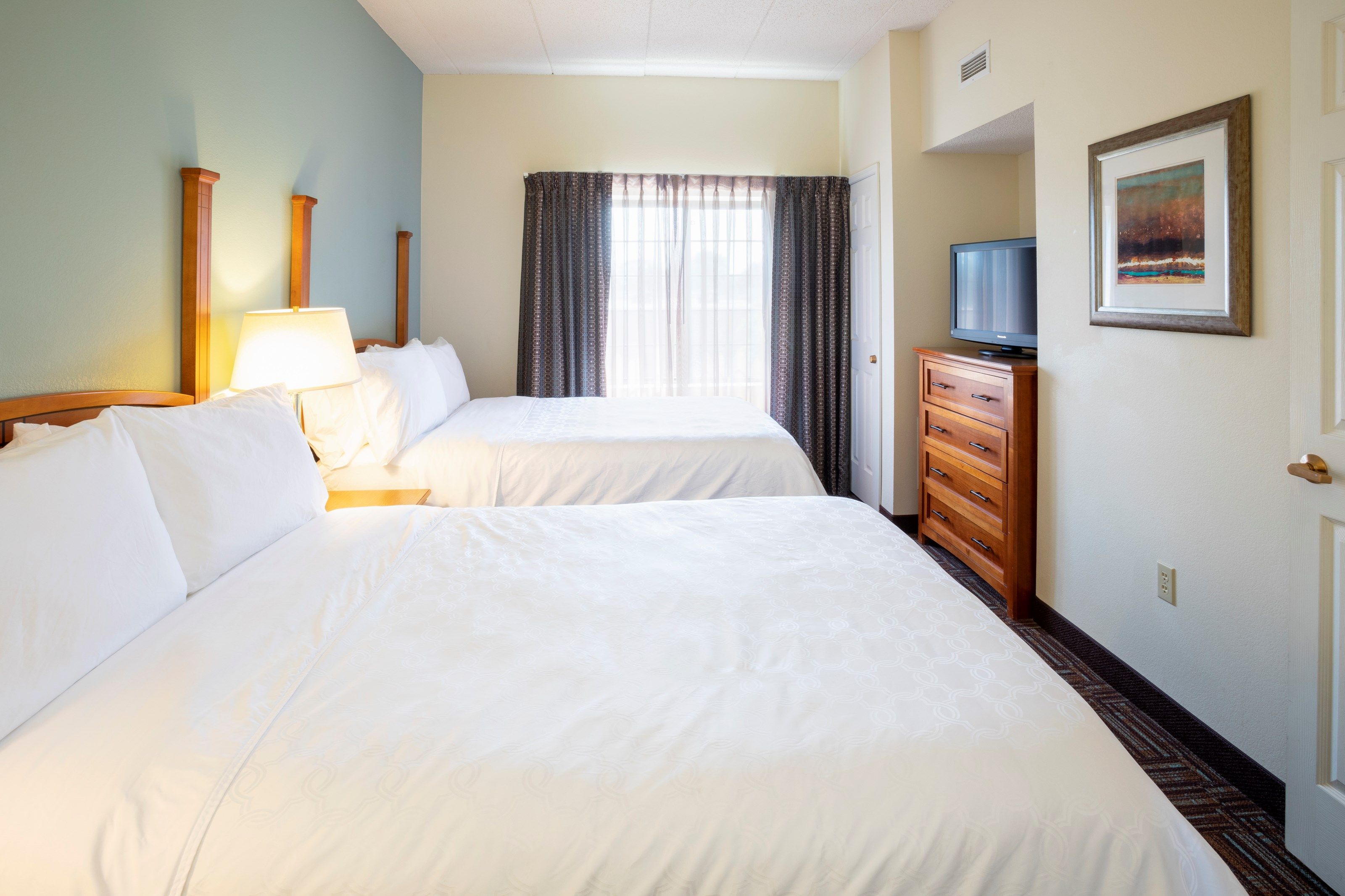 image Drift to sleep in a comfortable bed after a busy day.