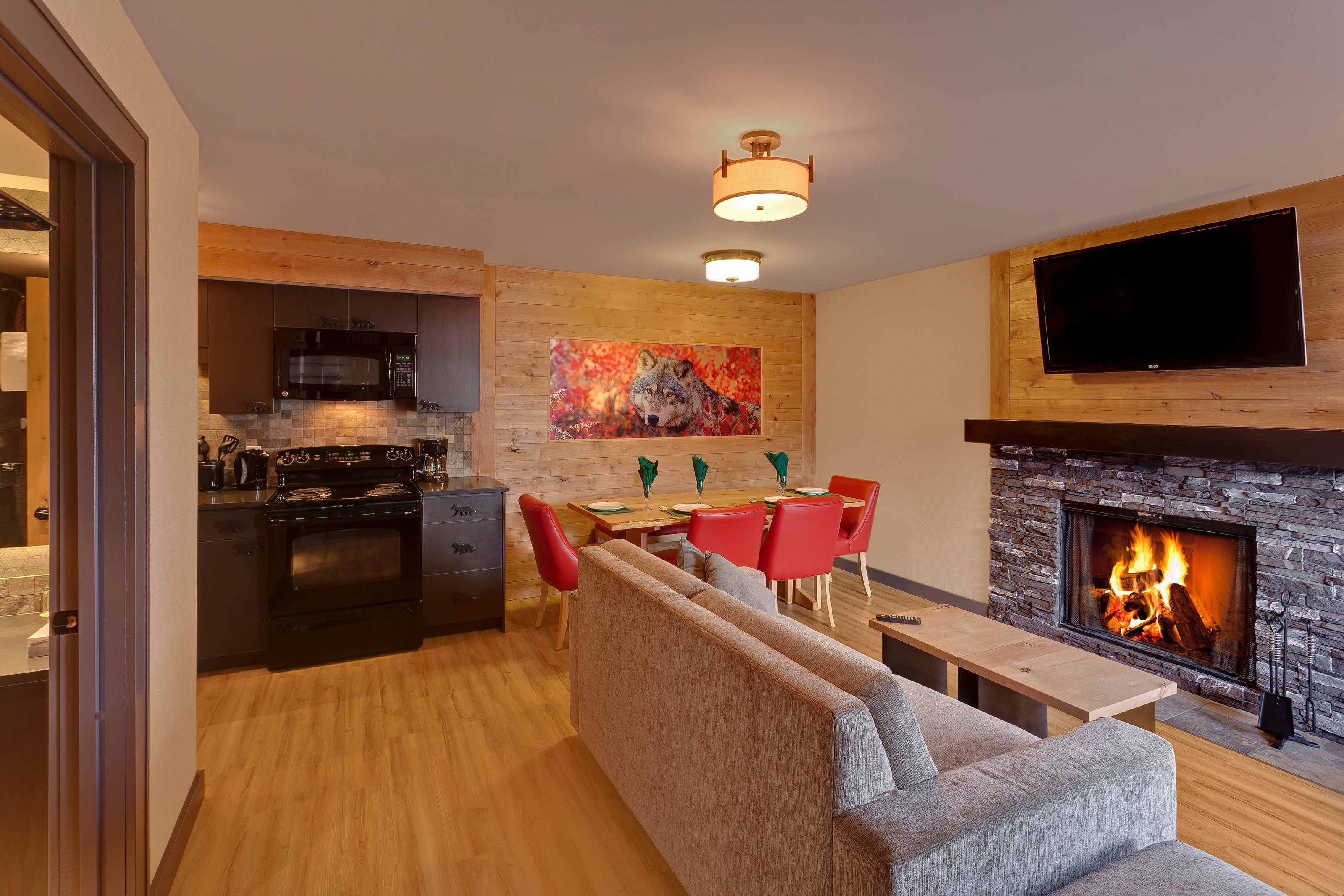 image Warm up by the stone-fronted wood-burning fireplace.