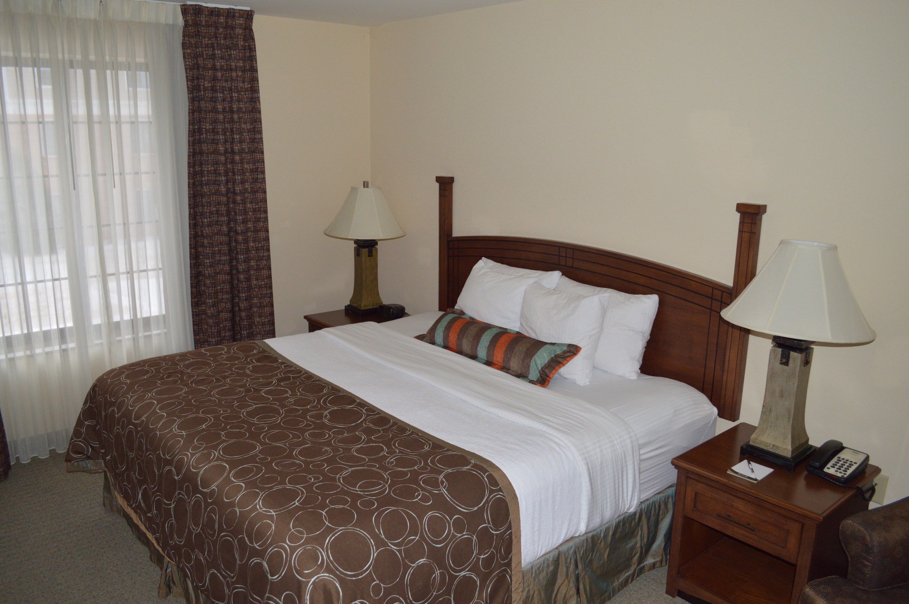 image Drift to sleep in a comfortable bed after a wonderful day outside.
