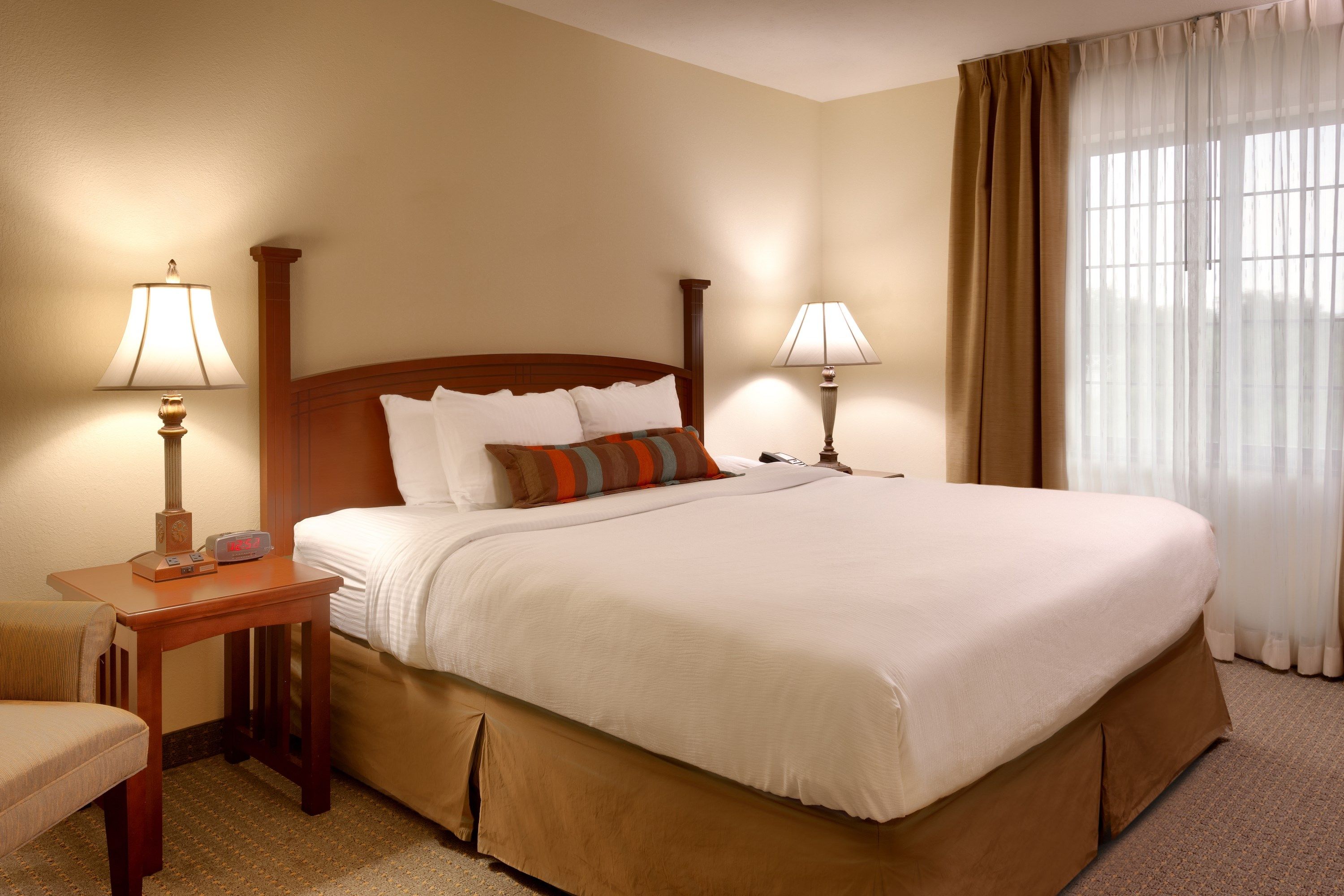 image Drift to sleep in a comfortable bed after a wonderful day outside.