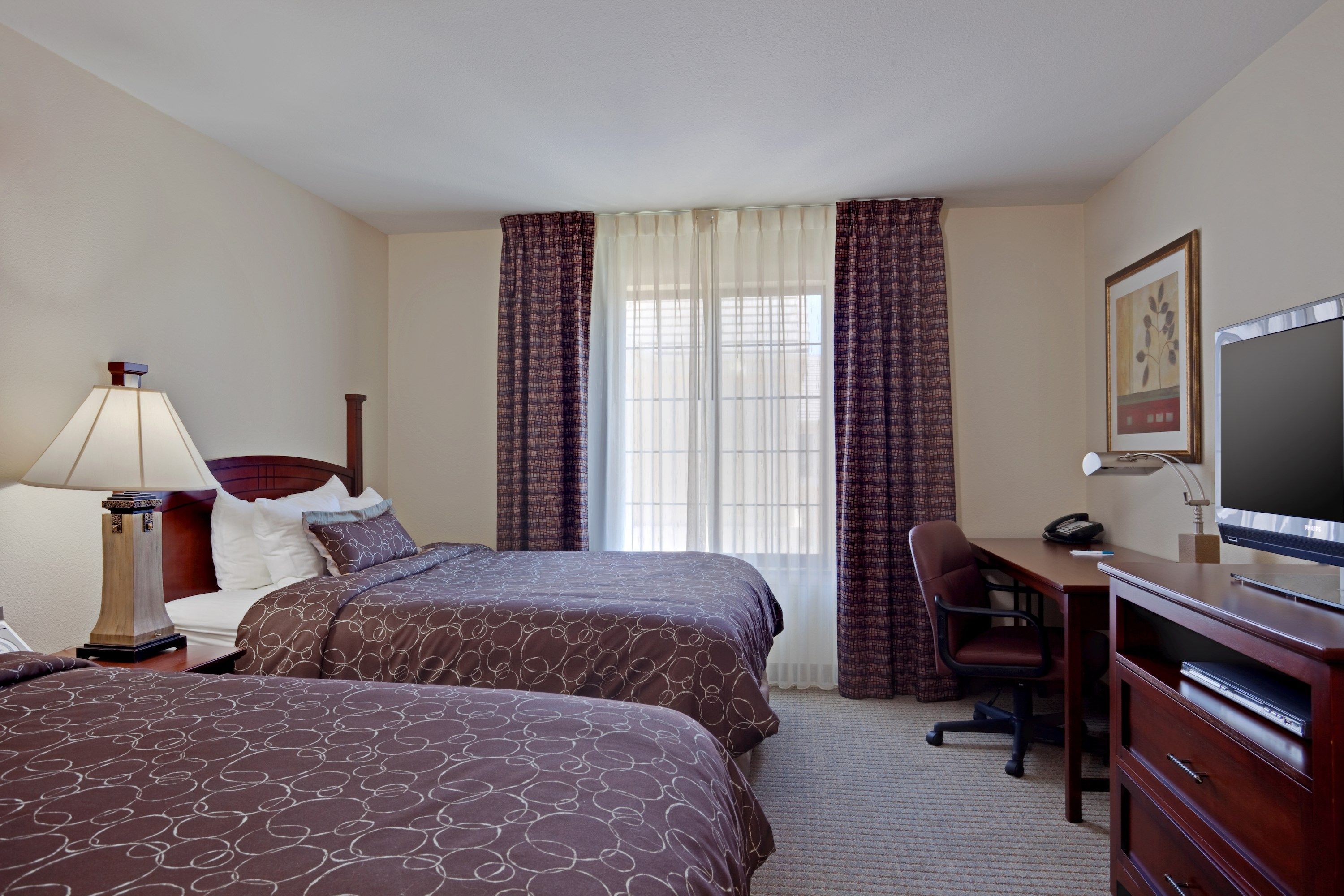 image Drift to sleep in a comfortable bed after a wonderful day outside.