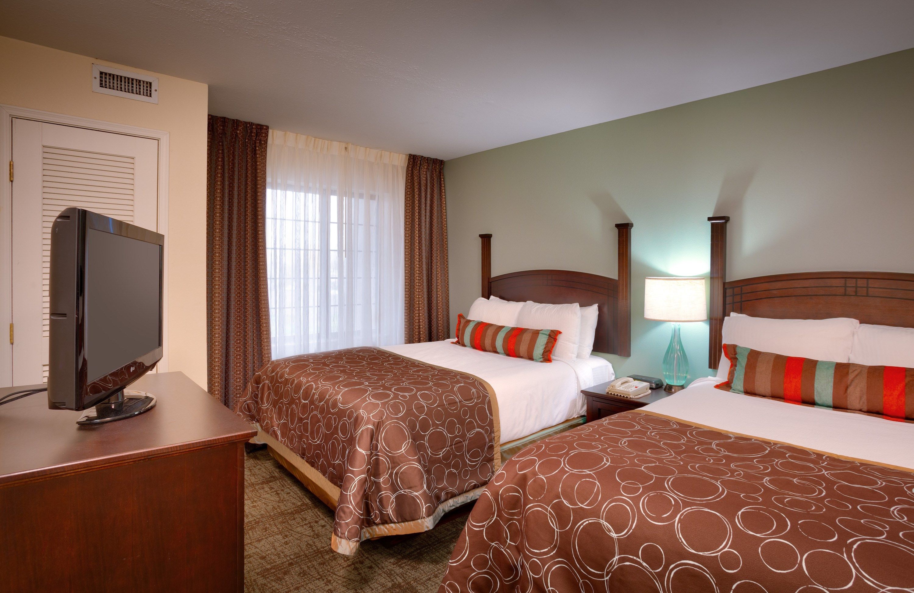 image Drift to sleep in a comfortable bed after a wonderful day outside.