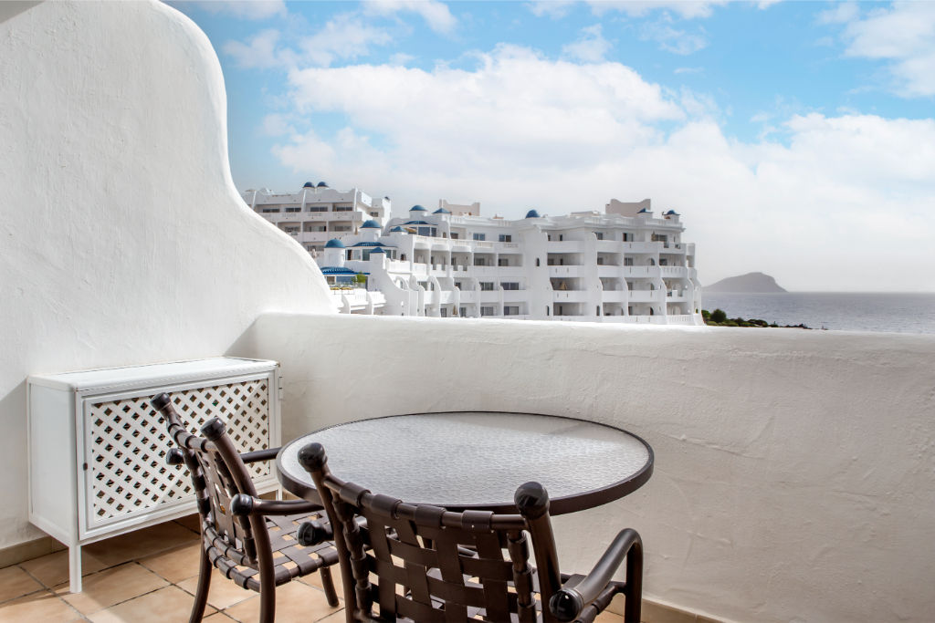 image Private balcony with seating, offering a secluded spot to enjoy the panoramic views.