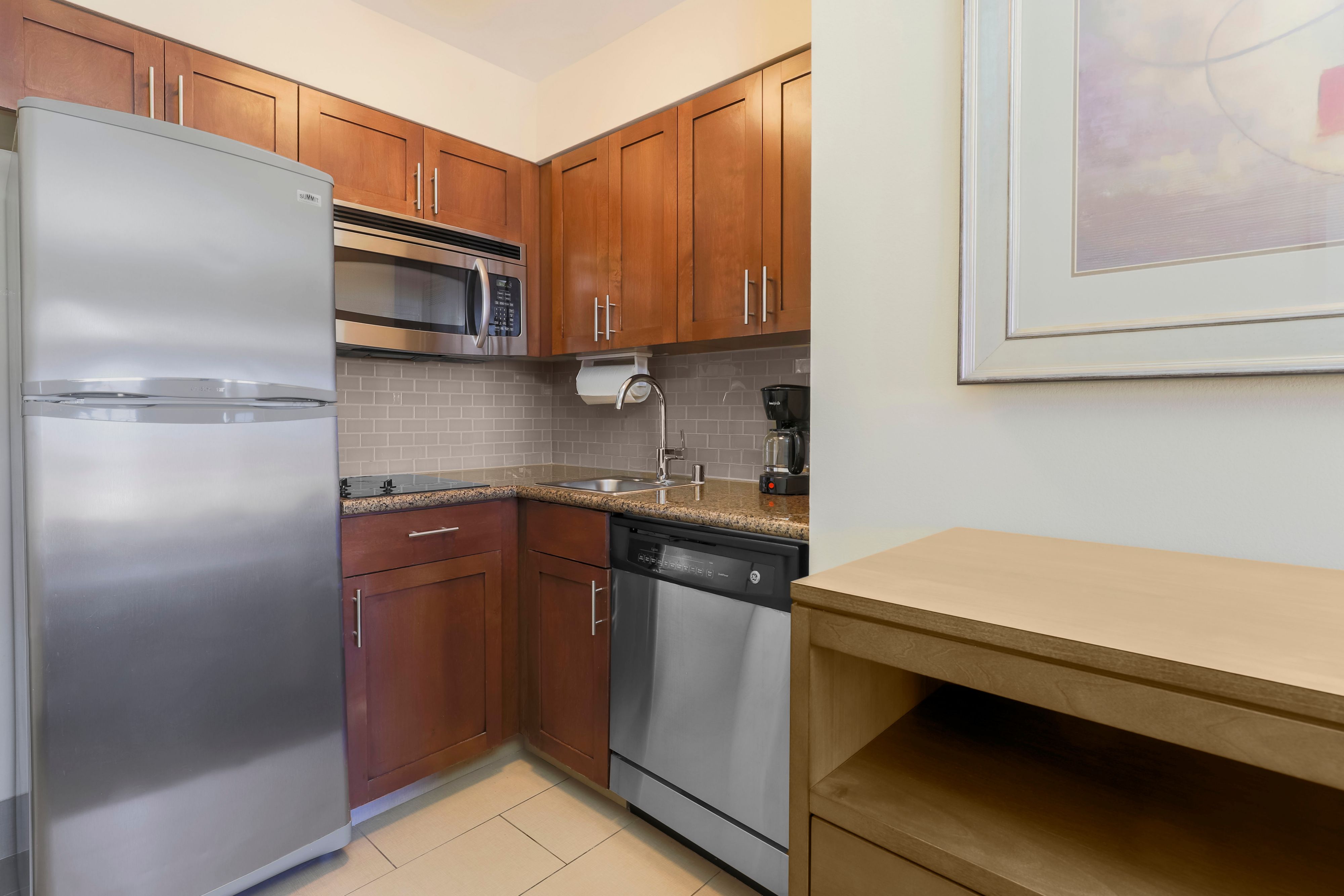 image Cook up a meal in the kitchen's modern appliances and ample cabinetry.