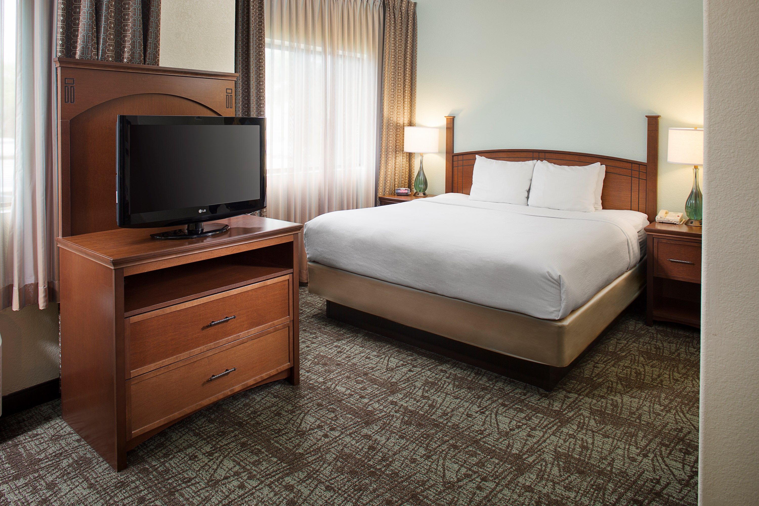image Drift to sleep in a comfortable bed after a wonderful day outside.