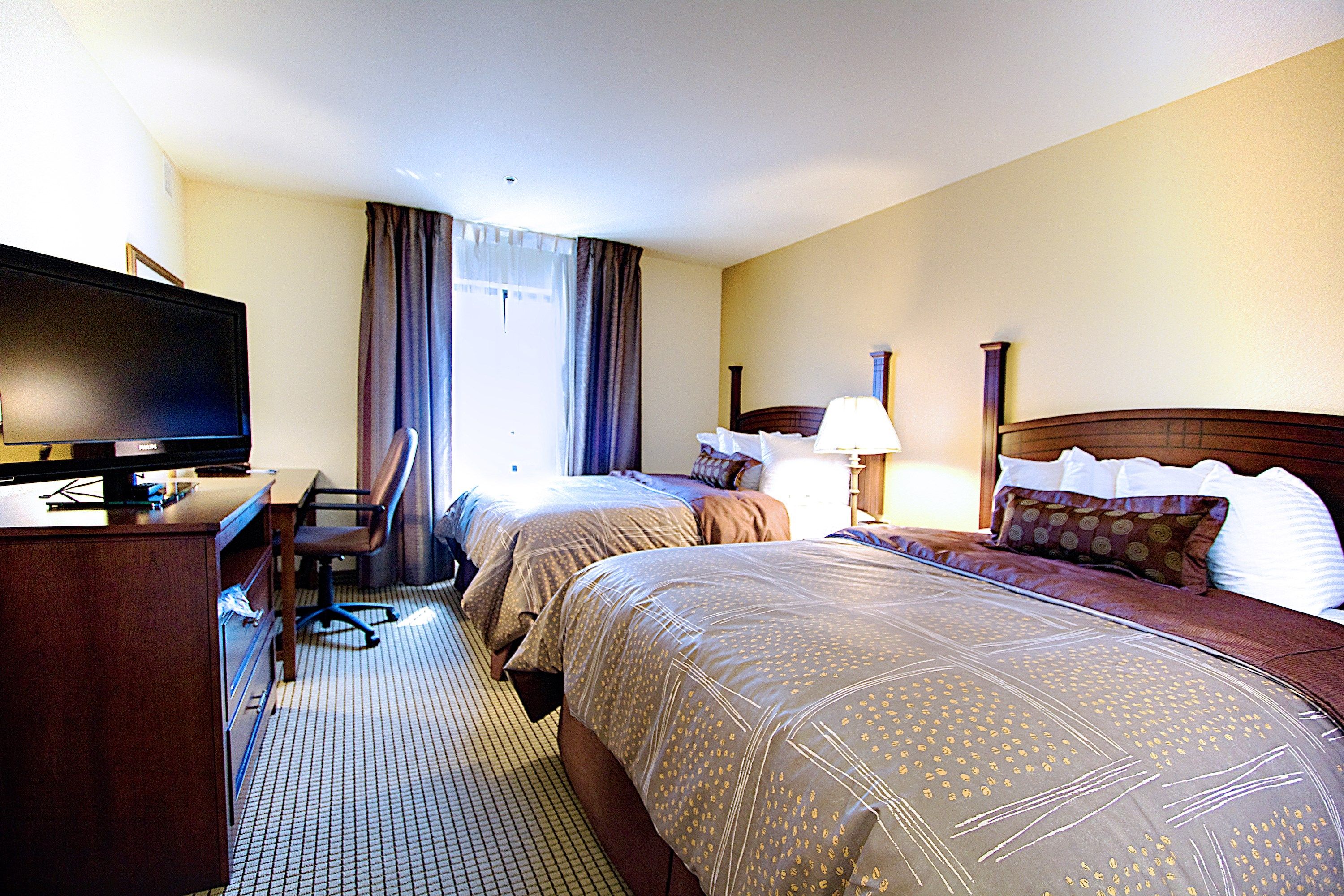 image Drift to sleep in a comfortable bed after a wonderful day outside.