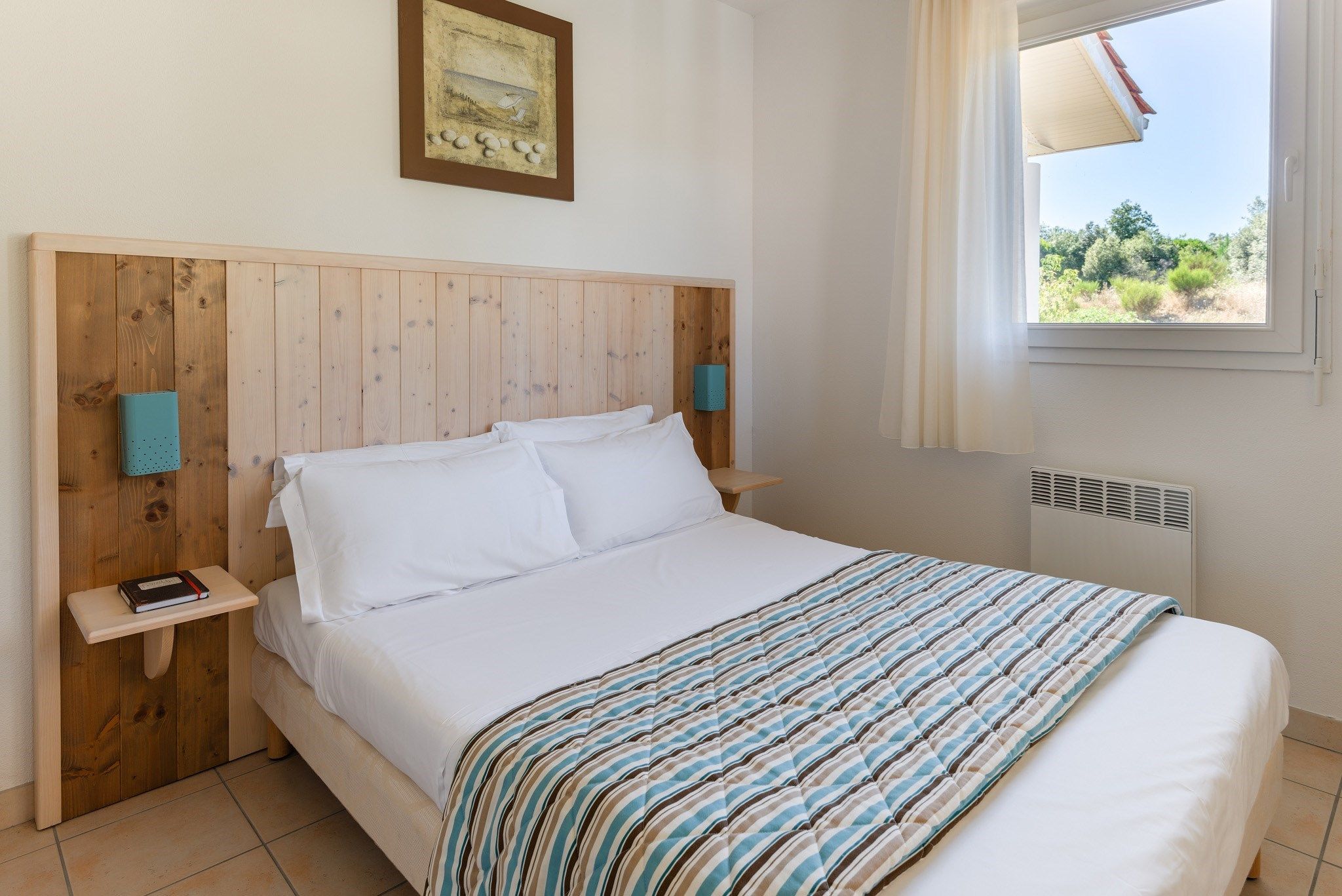 image Drift to sleep in a comfortable bed after a wonderful day outside.