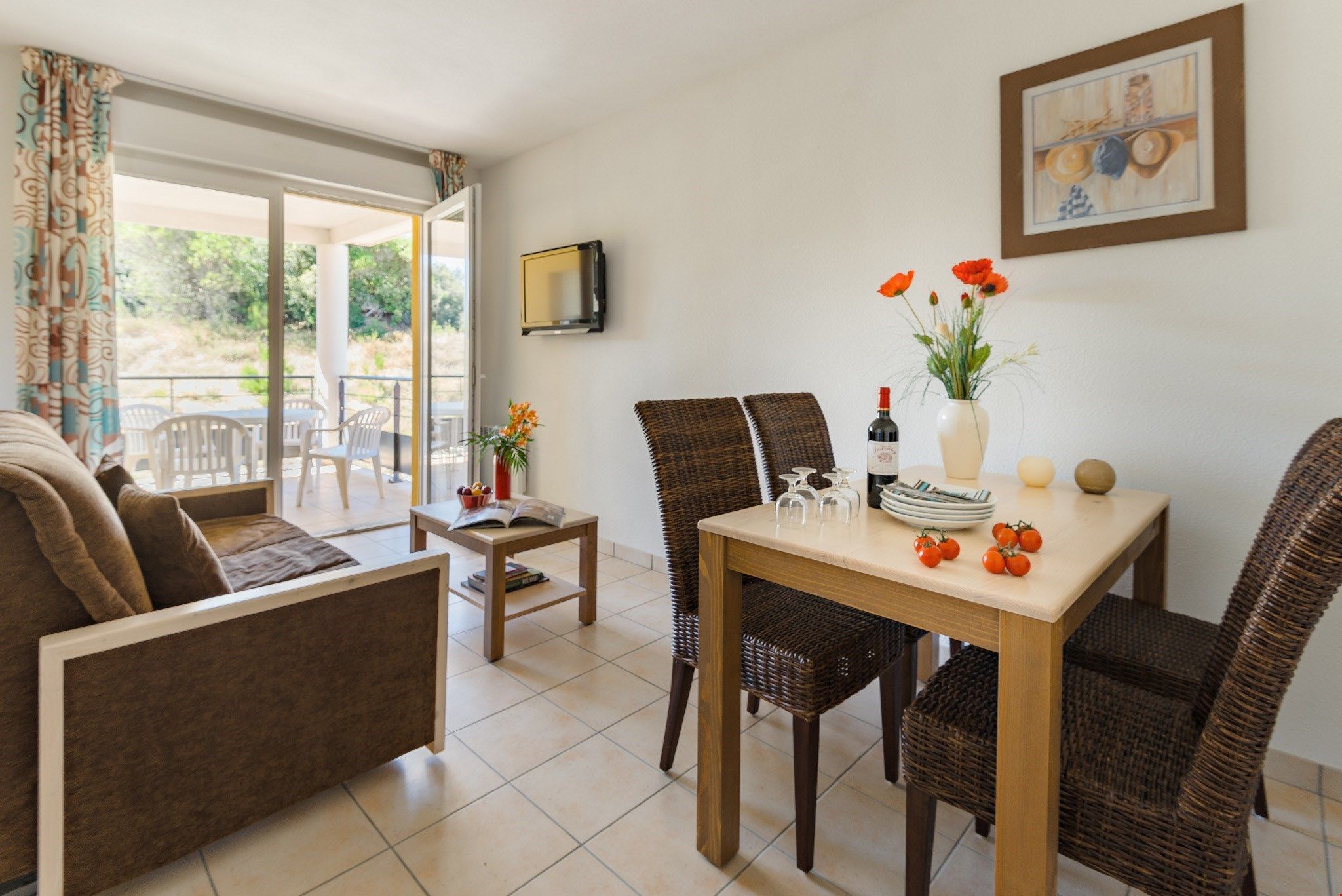 image Dine or gather around the dining room table.