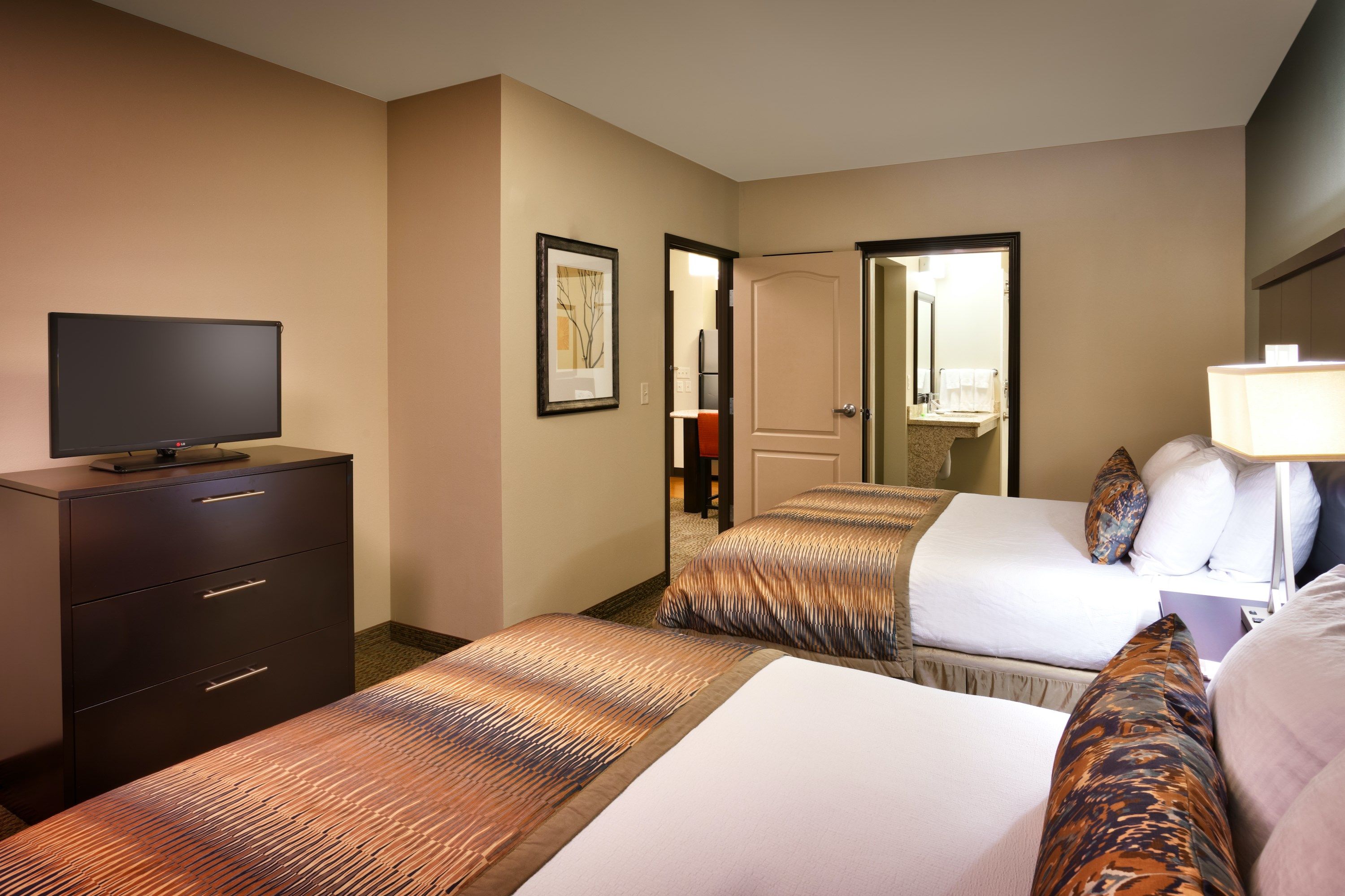 image Drift to sleep in a comfortable bed after a wonderful day outside.