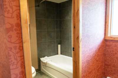 The shower/tub combo is perfect for those who want to soothe sore muscles in the tub.