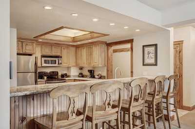 Have a seat at the breakfast bar.