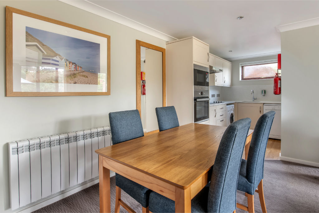 image Dine in comfort with our inviting dining area that feels like home.