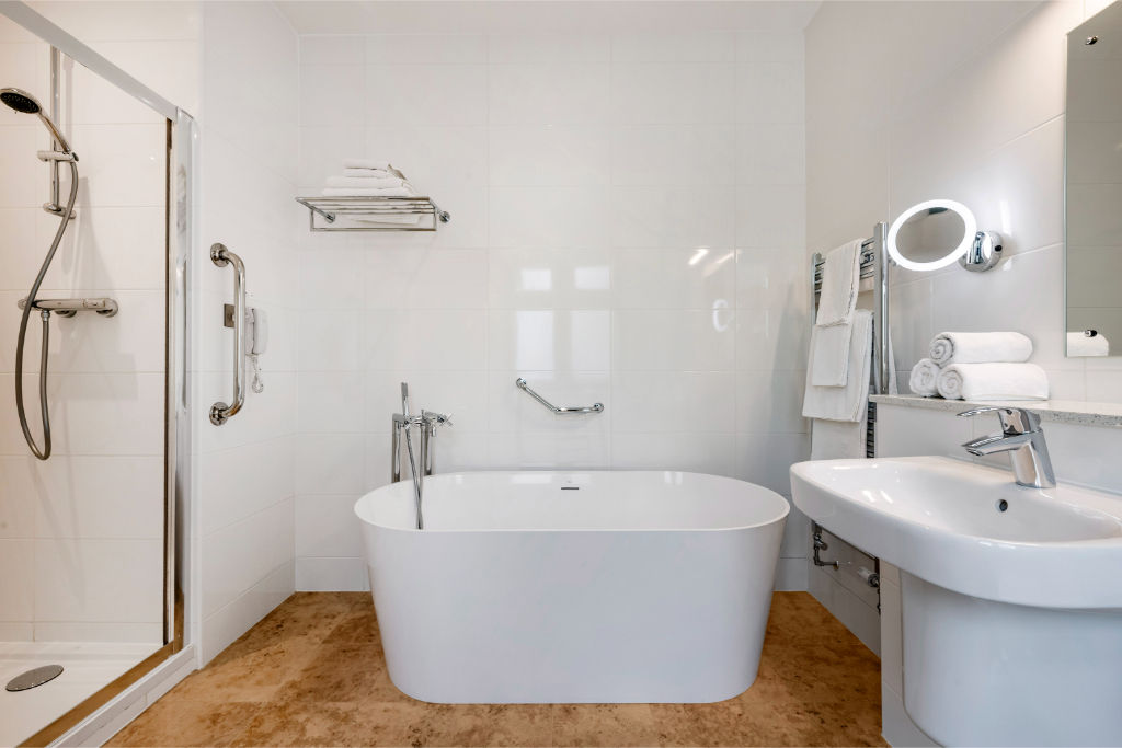 image Spacious bathroom with standalone tub for a relaxing soak.