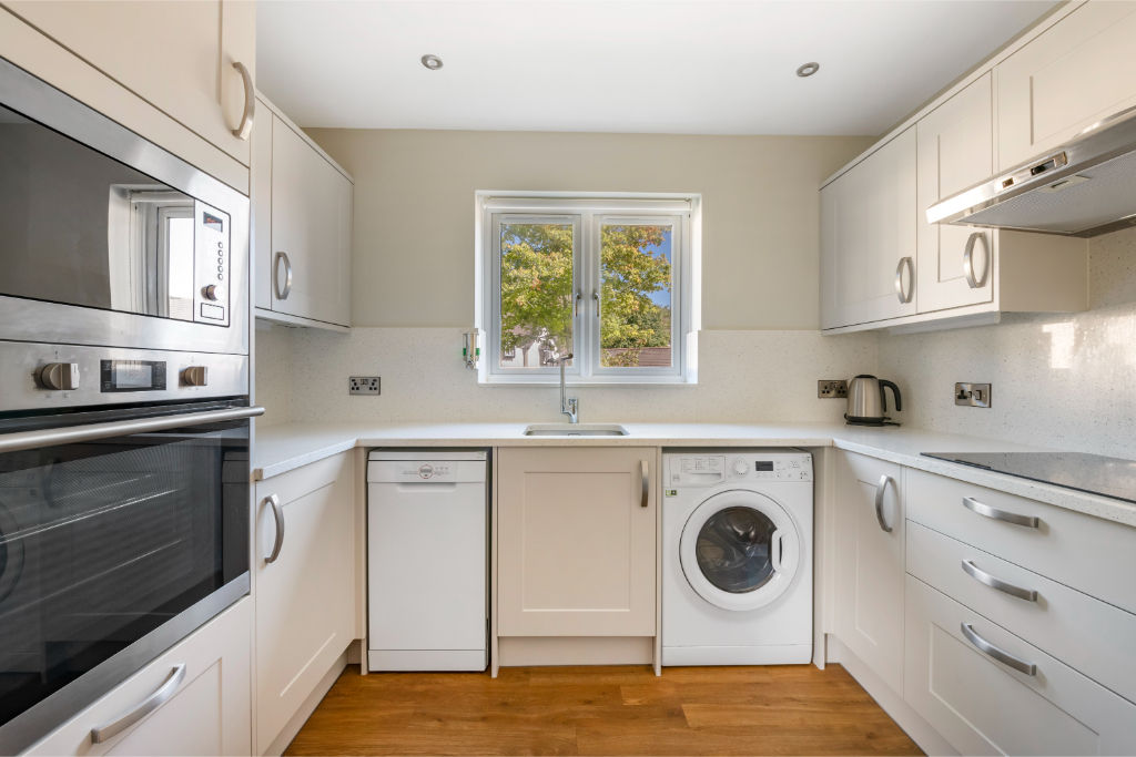 image A well-organized laundry space with all the essentials for home care.