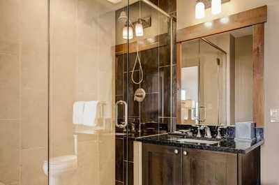 The modern bathroom features stylish décor.