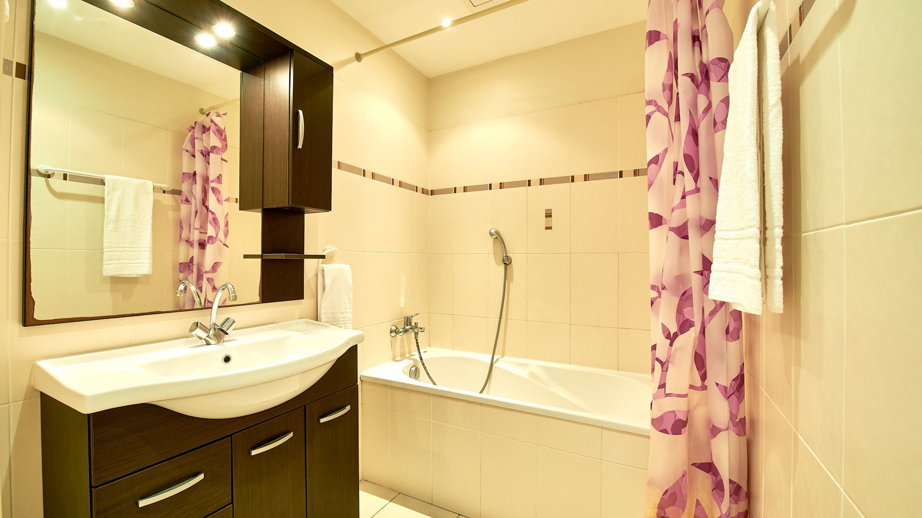 image Get ready for your day in the lovely bathroom.
