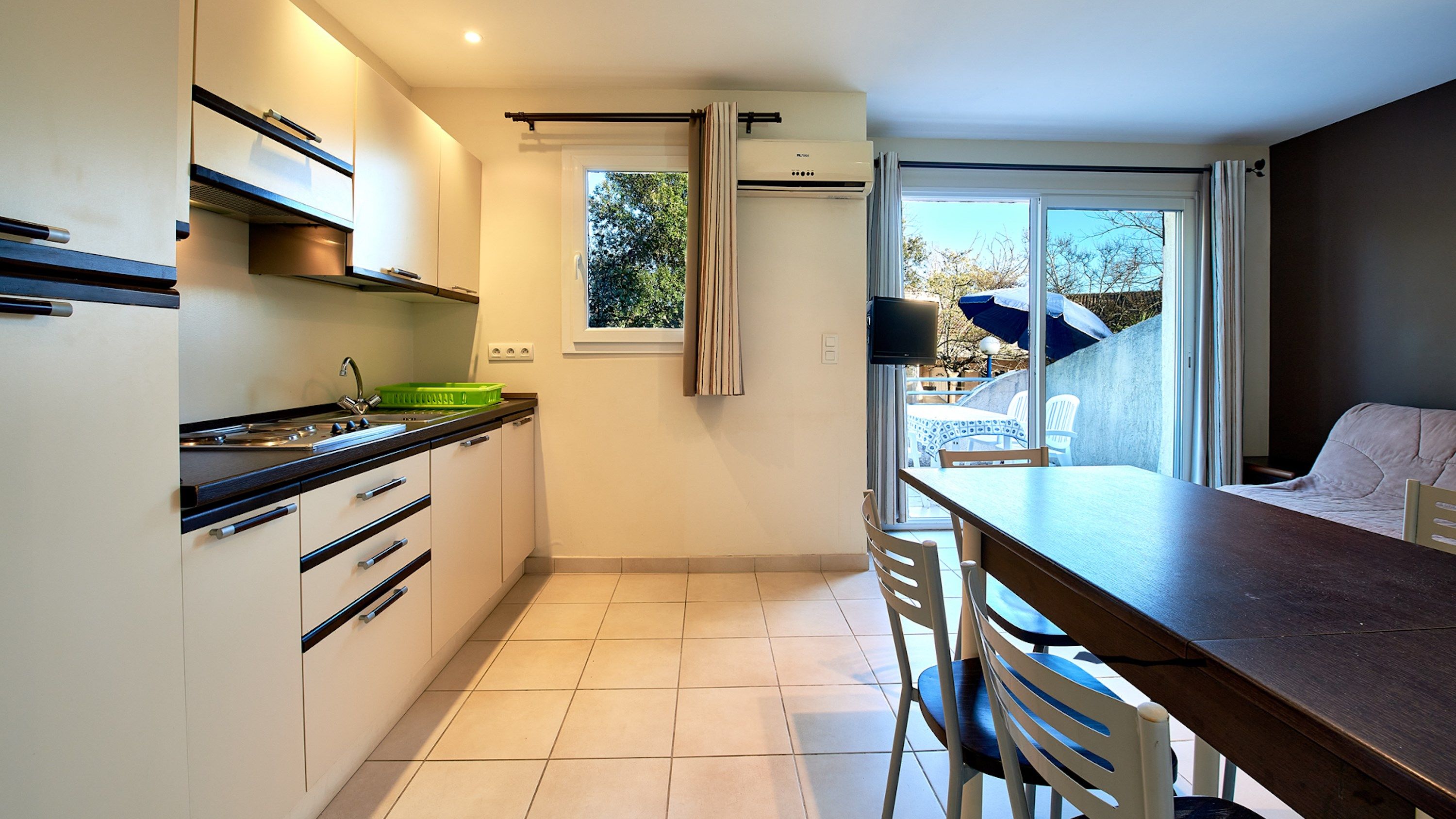 image Whip up a tasty meal in the equipped kitchenette.