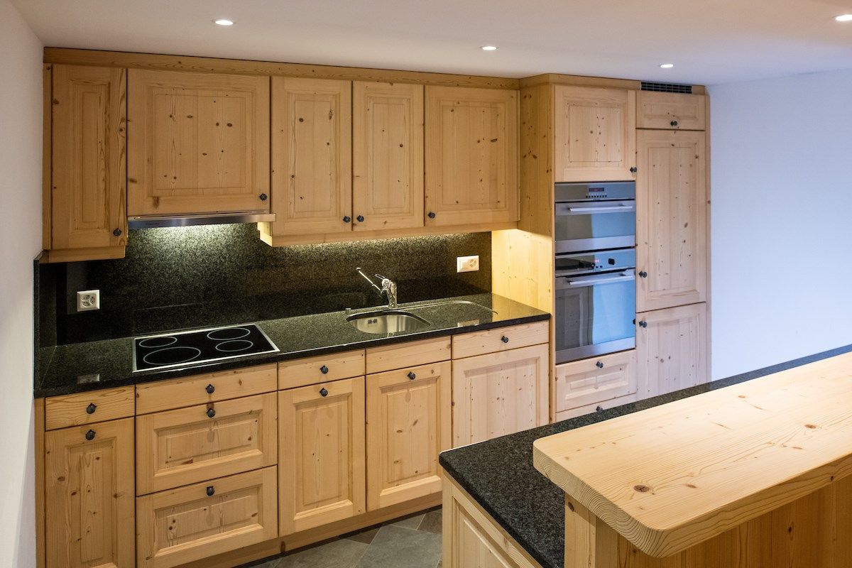 image Prepare a meal in the equipped kitchen.