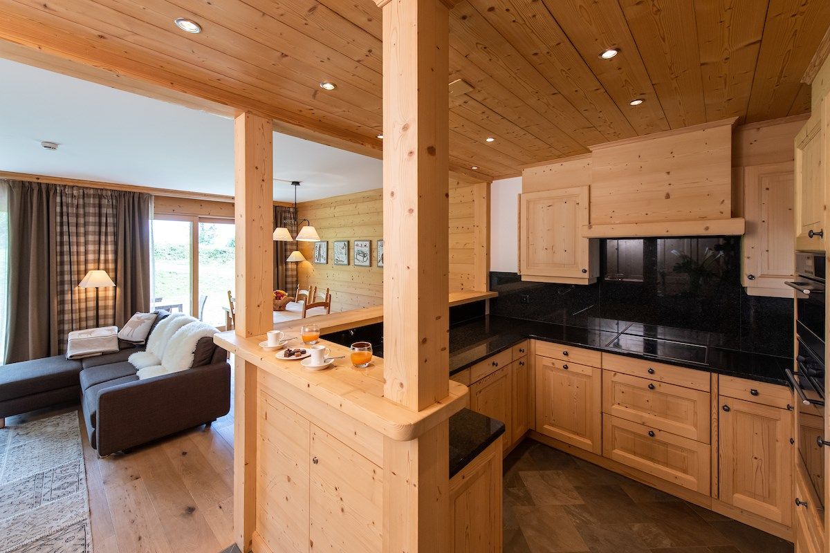 image Curb your appetite by cooking a meal in your kitchen.