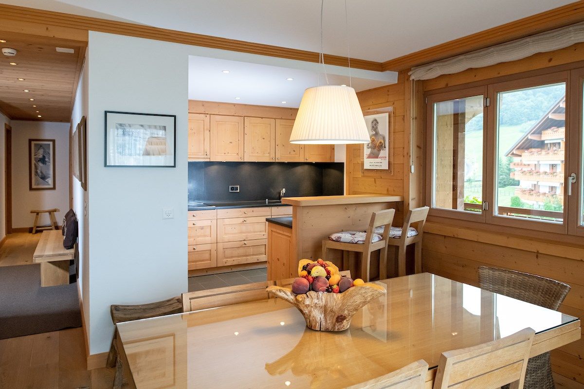 image Settle into the dining area and enjoy a nice meal.