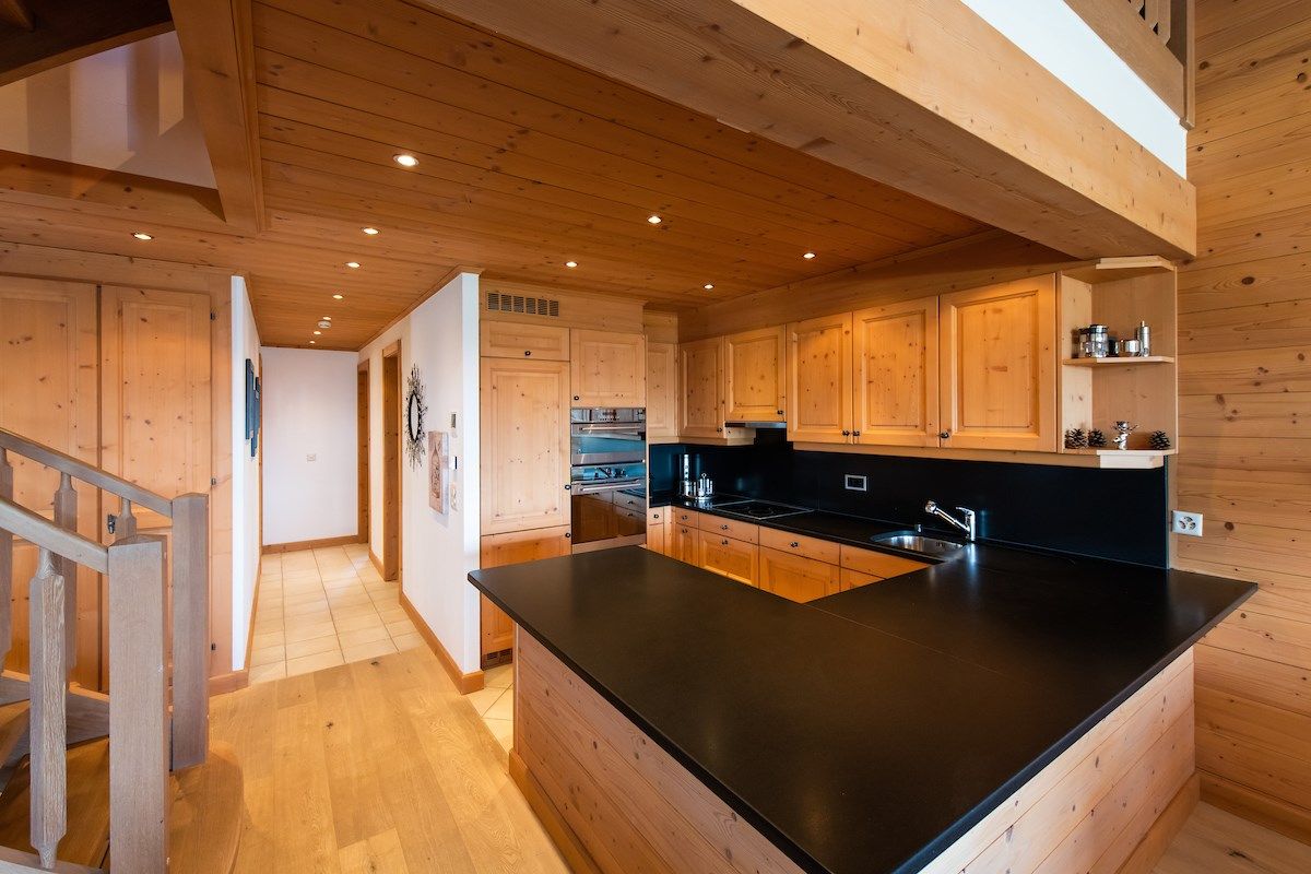 image Prepare a meal in the equipped kitchen.