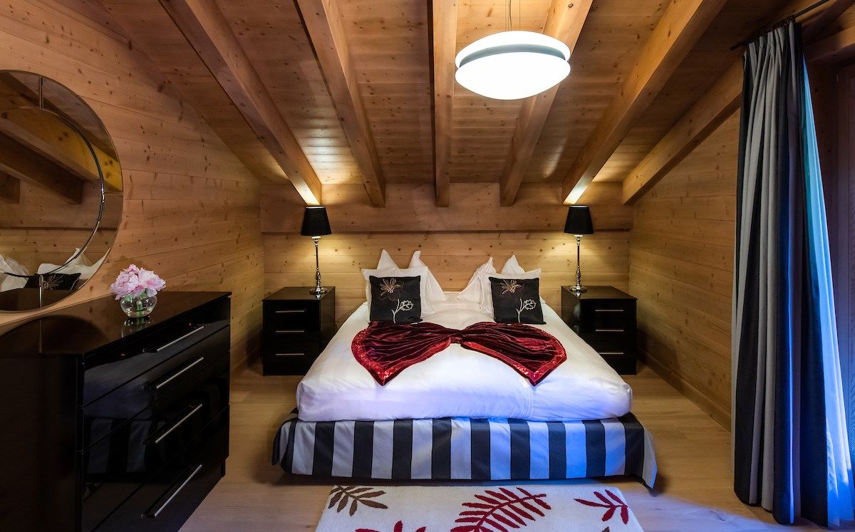 image Drift to sleep in a comfortable bed after a wonderful day outside.