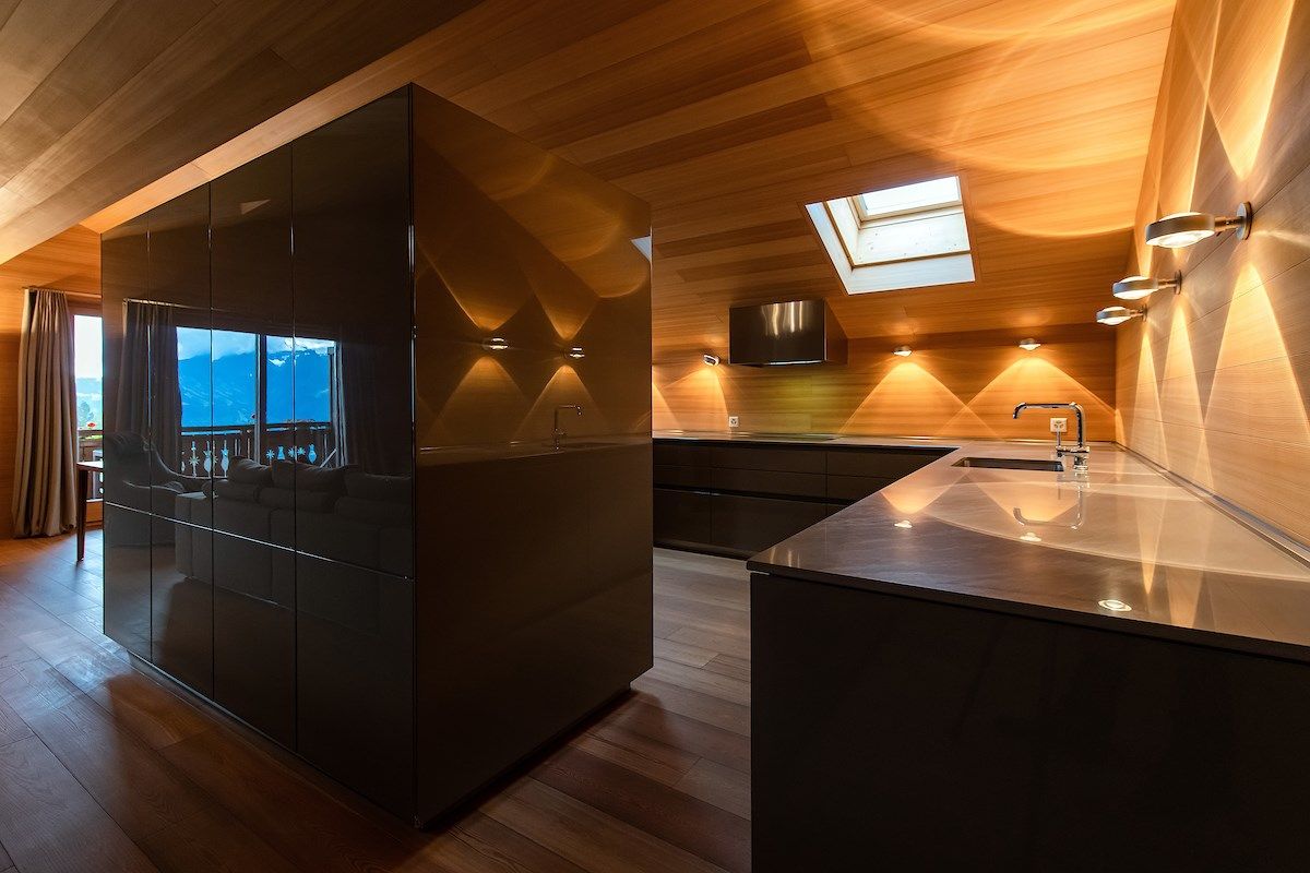 image Curb your appetite by cooking a meal in your kitchen.