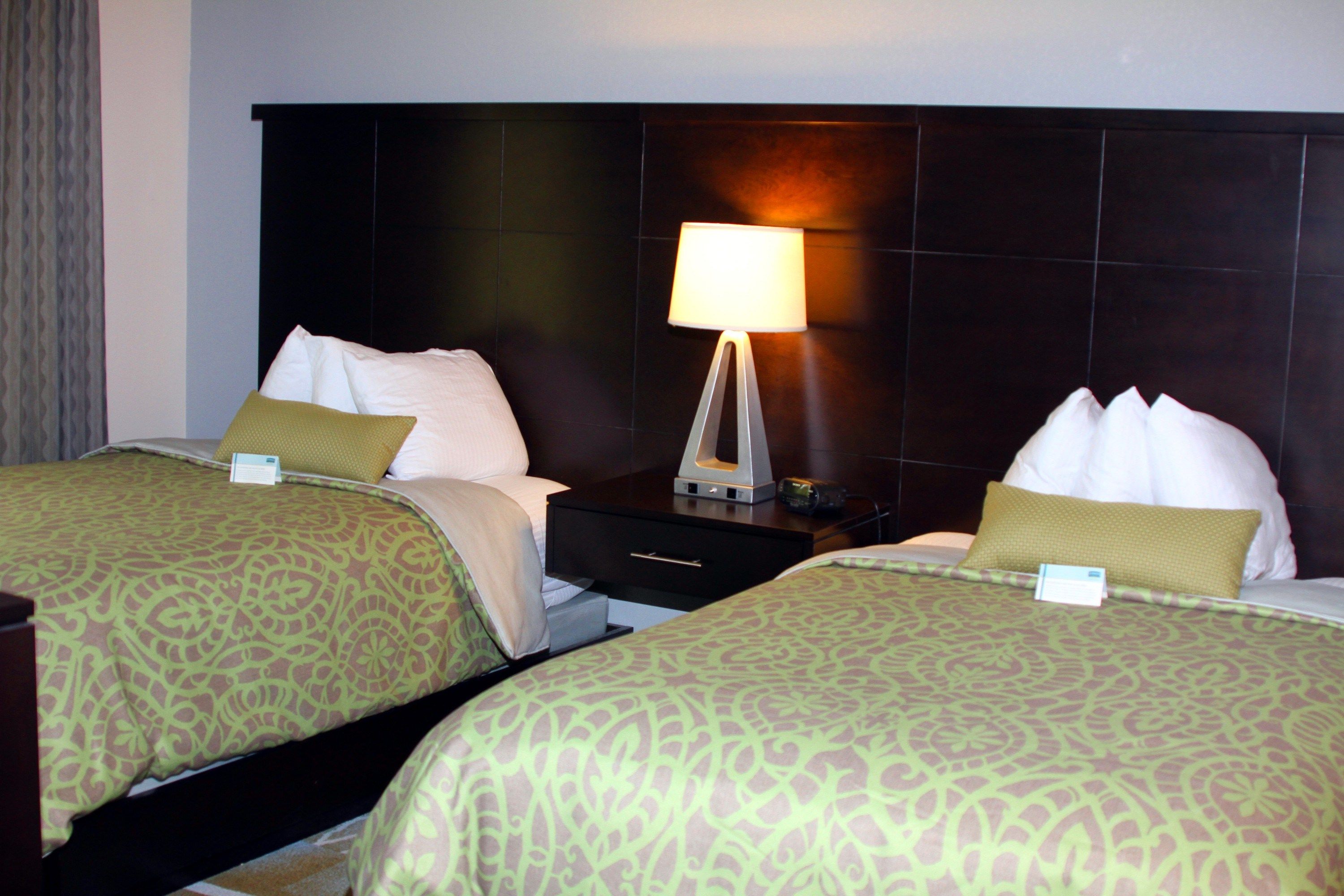 image Drift to sleep in a comfortable bed after a wonderful day outside.