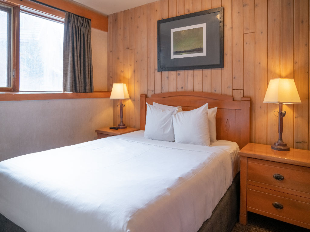 image Get a great night's sleep in this plush queen-sized bed.