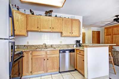 Prepare meals in the fully-equipped kitchen.