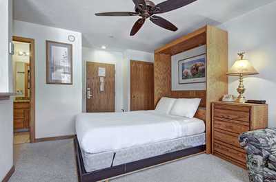 Get a good night's sleep in the comfortable queen Murphy bed.