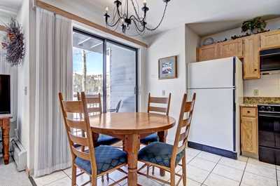 Play board games with your group at the dining table after a day in the mountains.