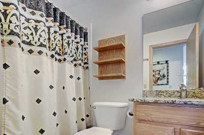 Get ready for your day in the lovely bathroom.