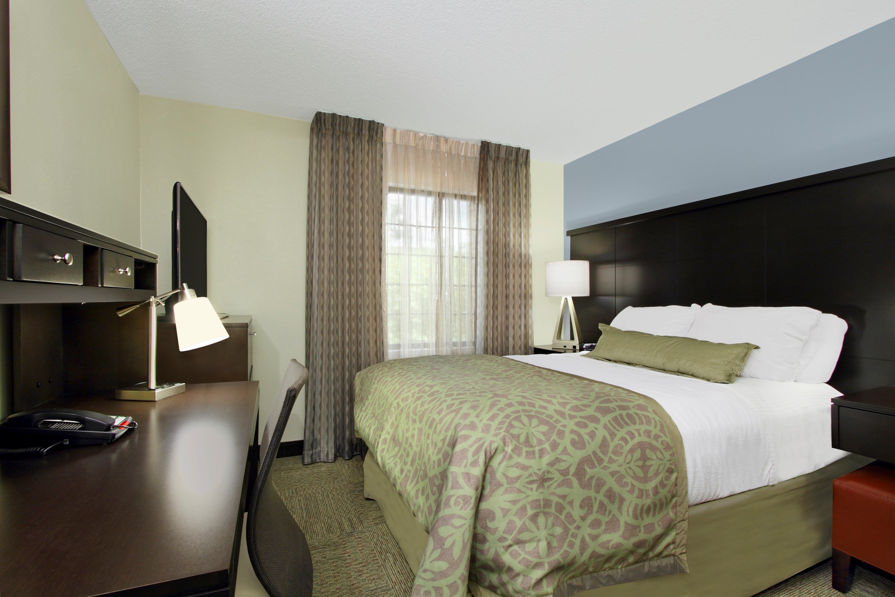 image Drift to sleep in a comfortable bed after a wonderful day outside.