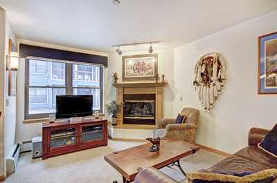 Warm up in front of the classic fireplace in our cozy unit!