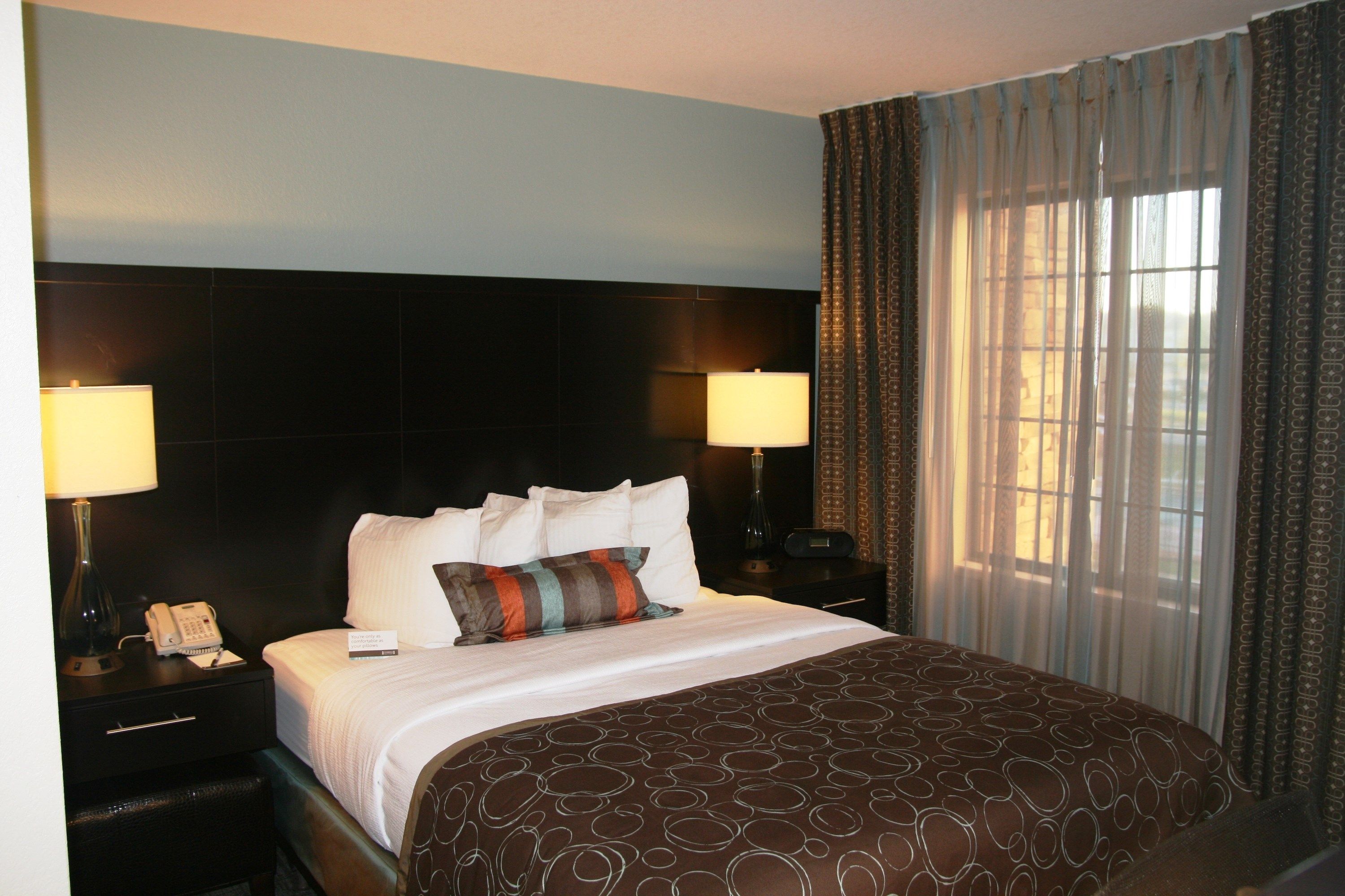 image Drift to sleep in a comfortable bed after a wonderful day outside.