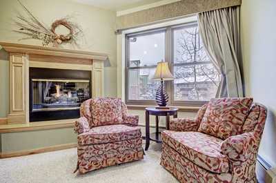Take a seat by the fireplace and warm up during the colder winter days.