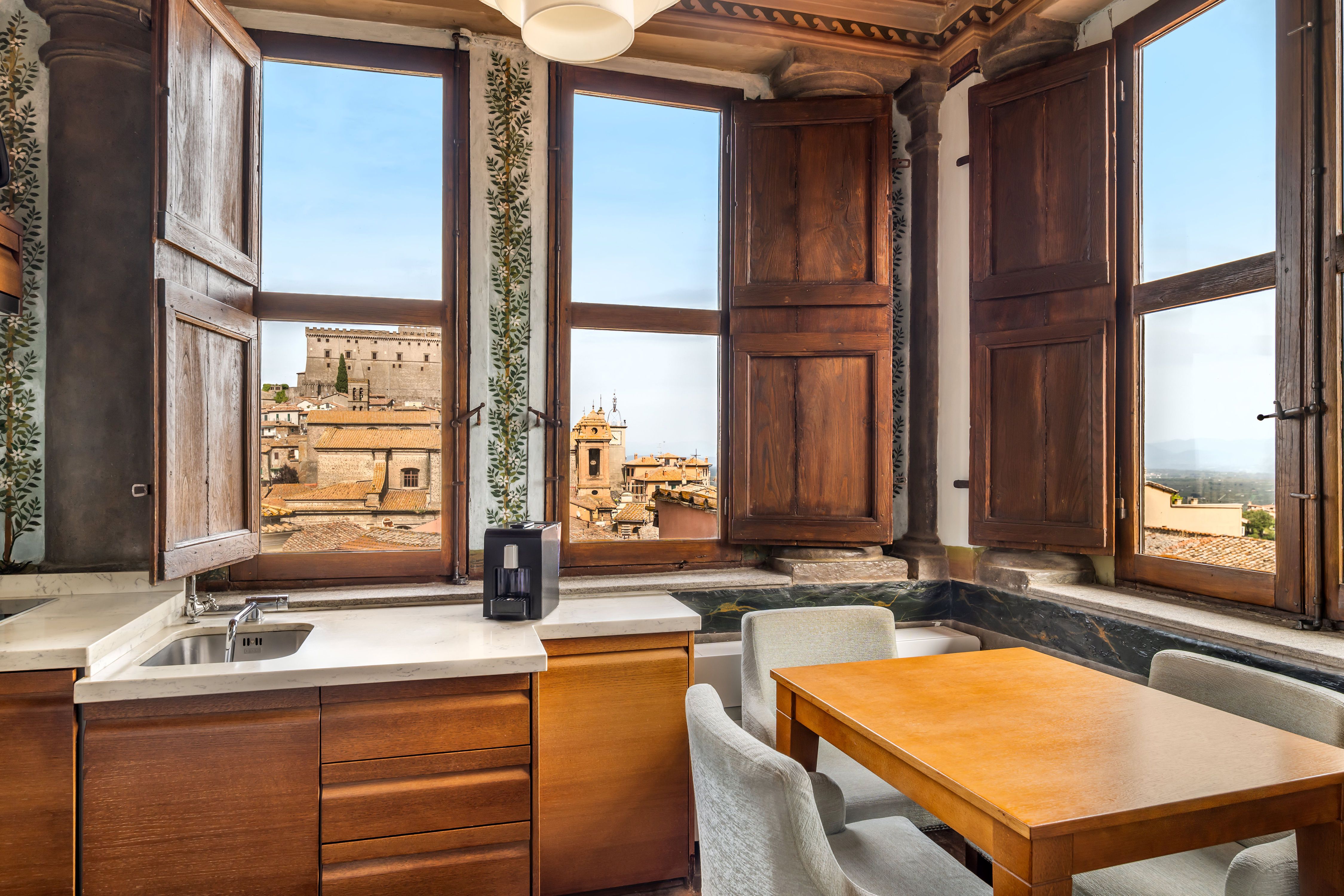 image A quaint and charming kitchenette with a vintage feel, perfect for whipping up cozy meals.