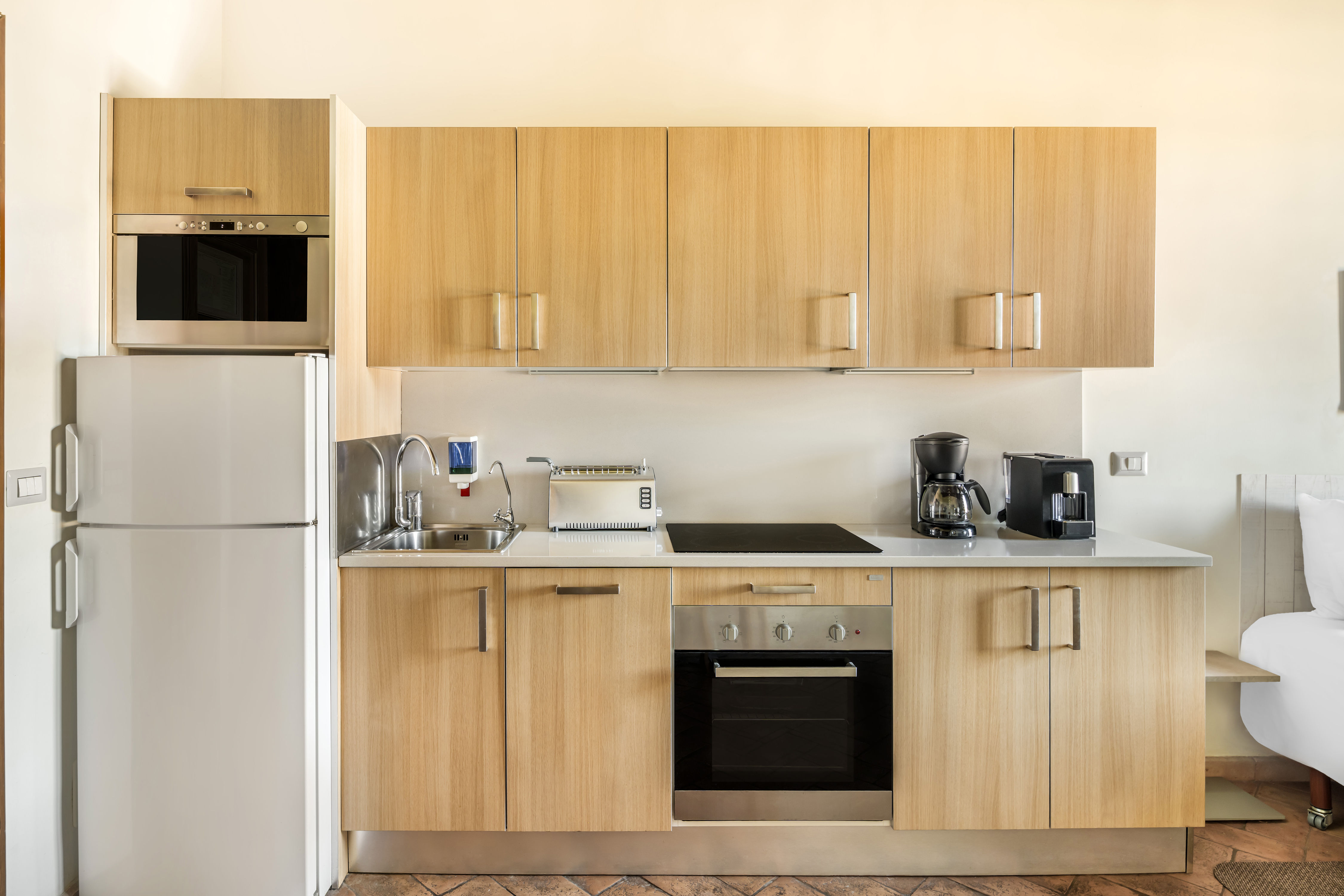 image Cook authentic Italian meals in a bright kitchen equipped for easy, modern living.